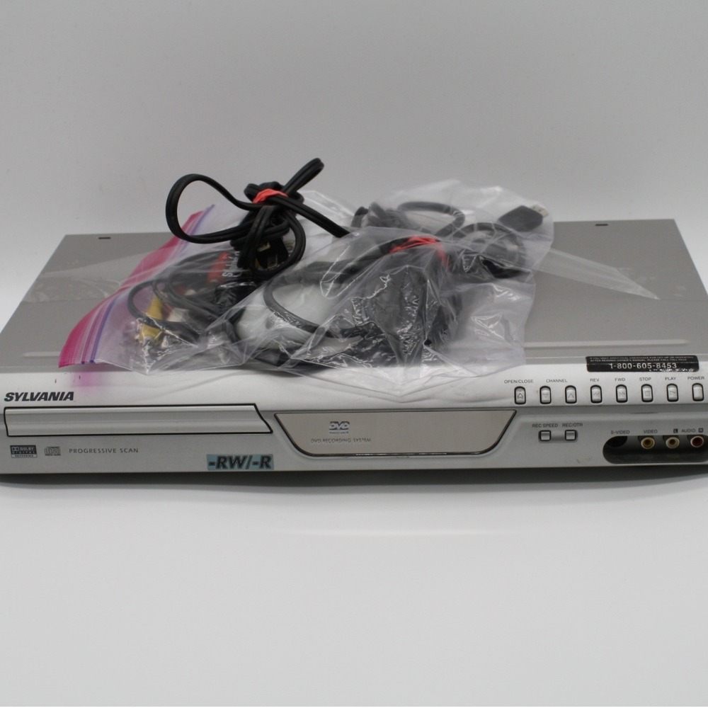 Sylvania DVD Player/Recorder Silver W/ Remote + Power/Media Cables. Power Tested